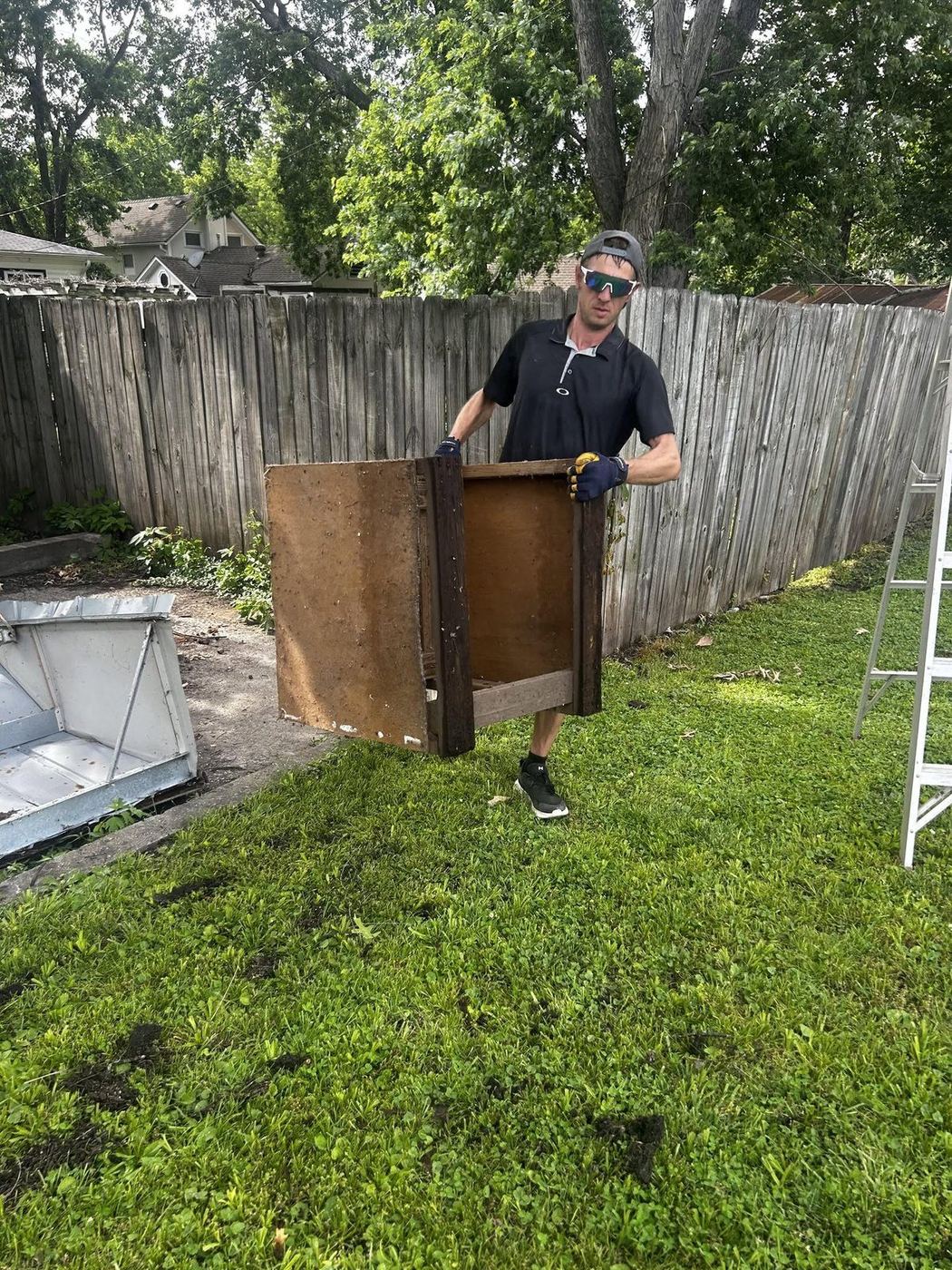 Furniture item being removed from a yard